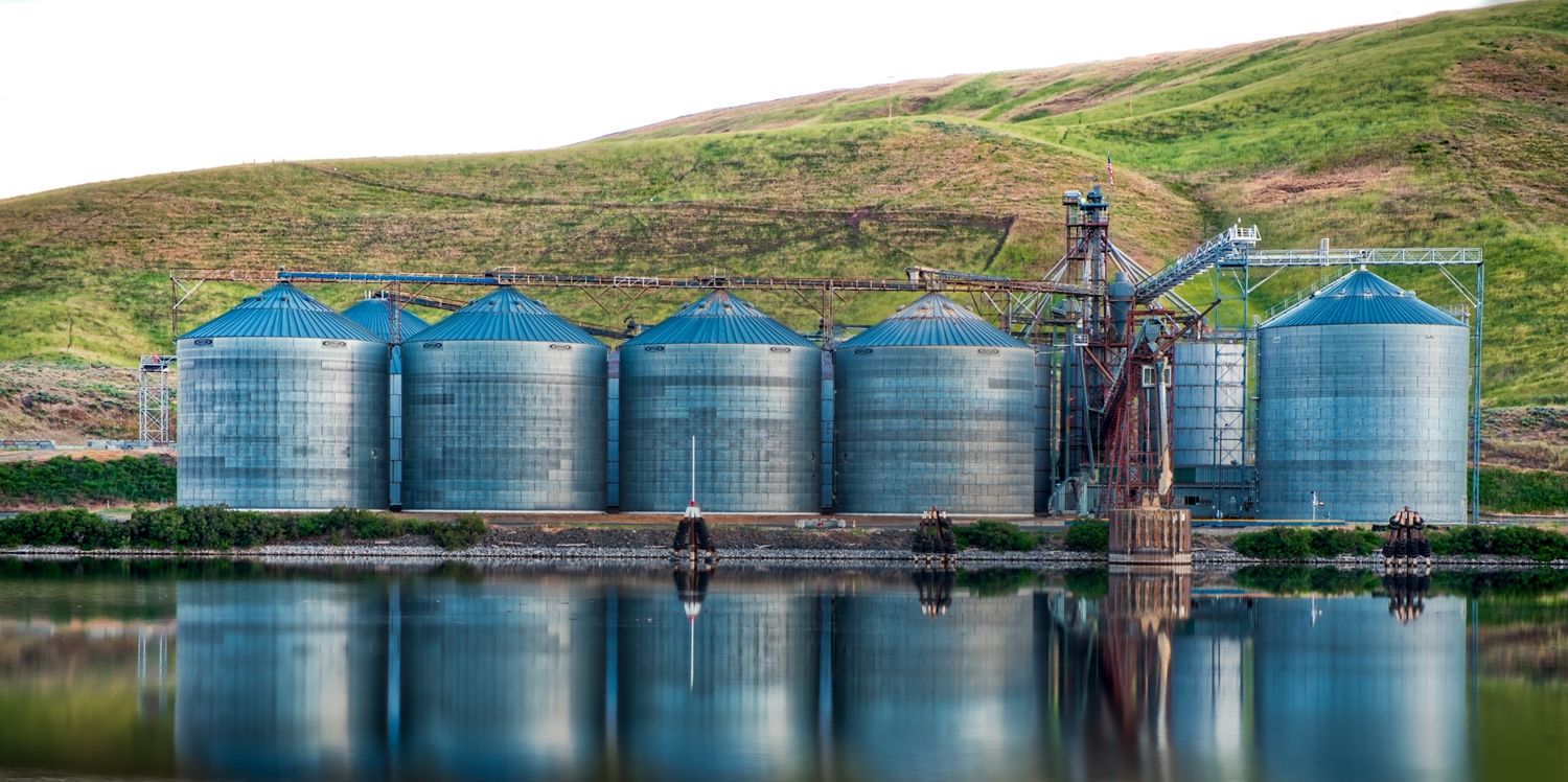 panoramic-shot-industrial-buildings-shore-lake-reflected-water.jpg